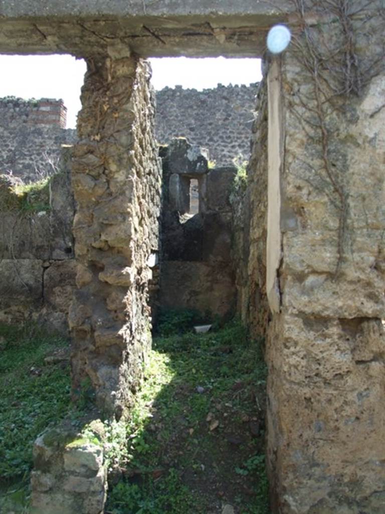 VII.3.29 Pompeii. March 2009. Doorway to Room 16. Stairs to upper floor.