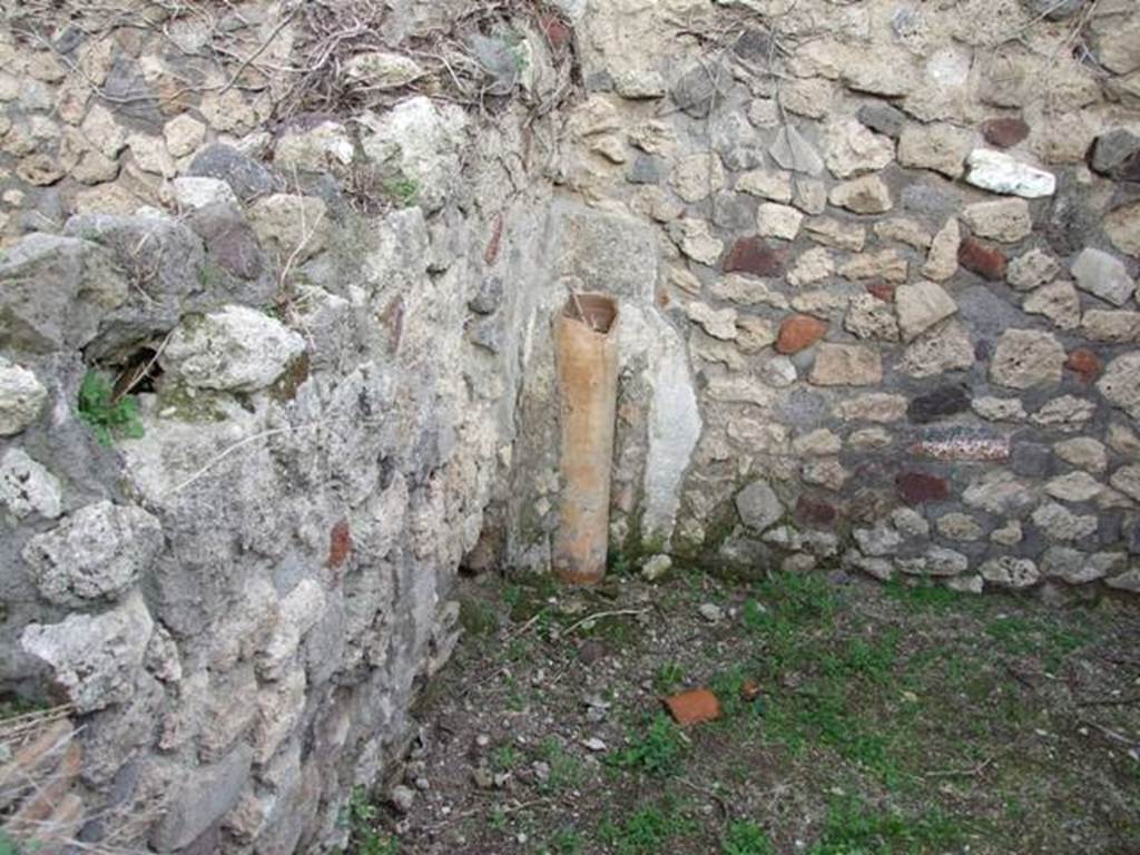 VII.3.39 Pompeii. December 2007. Waste pipe from upper floor in north-east corner of kitchen and latrine on east side, at rear of VII.3.1/2.