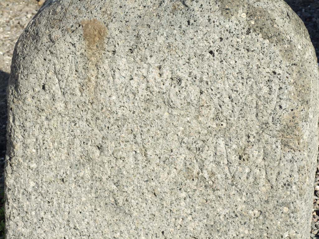 VII.4.2 Pompeii. December 2007.
Boundary marker made of volcanic tufa between Temple of Fortuna Augusta and the Area Privata of M. Tullius.
Inscription on front says, “Private land of Marcus Tullius, son of Marcus”.