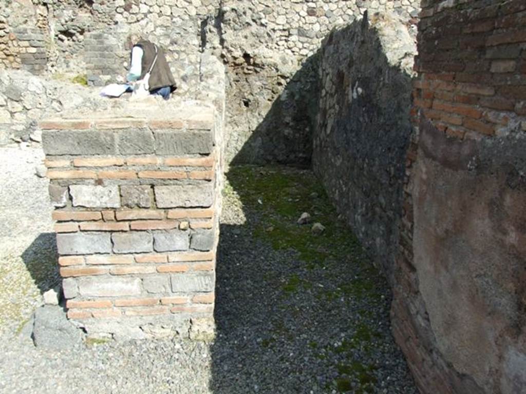 VII.4.4 Pompeii. March 2009. Long narrow room or corridor, at east rear side of stairs to upper floor.