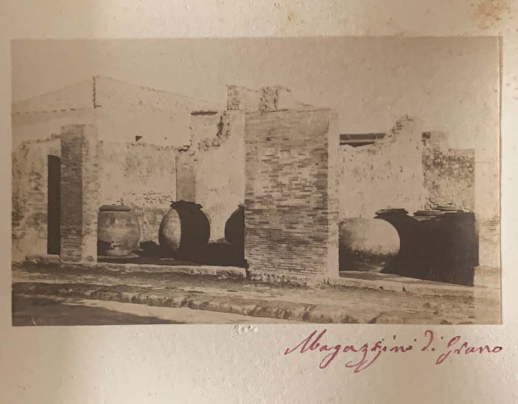 VII.4.13, in centre, and 14, on right. From an album dated c.1875-1885. Looking east across Via del Foro.
According to the writing, this was a warehouse for flour. Photo courtesy of Rick Bauer.