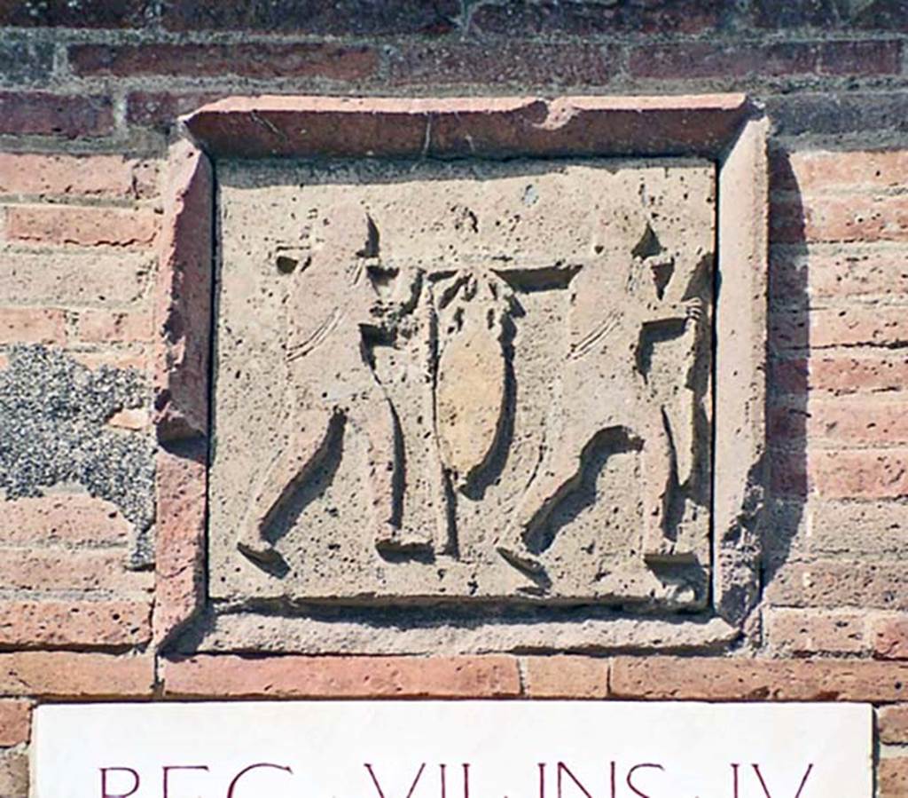 VII.4.16 Pompeii. October 2001. Plaque on west corner pilaster. Photo courtesy of Peter Woods.