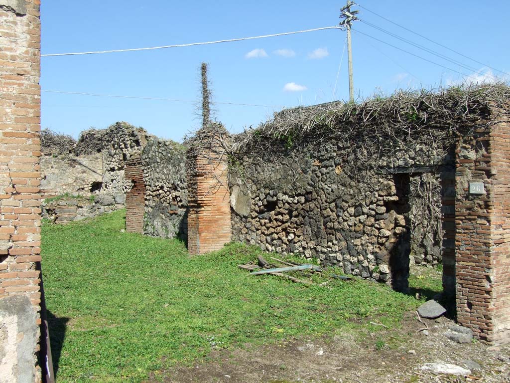 VII.4.26 Pompeii. March 2009. East wall with doorway to VII.4.27
