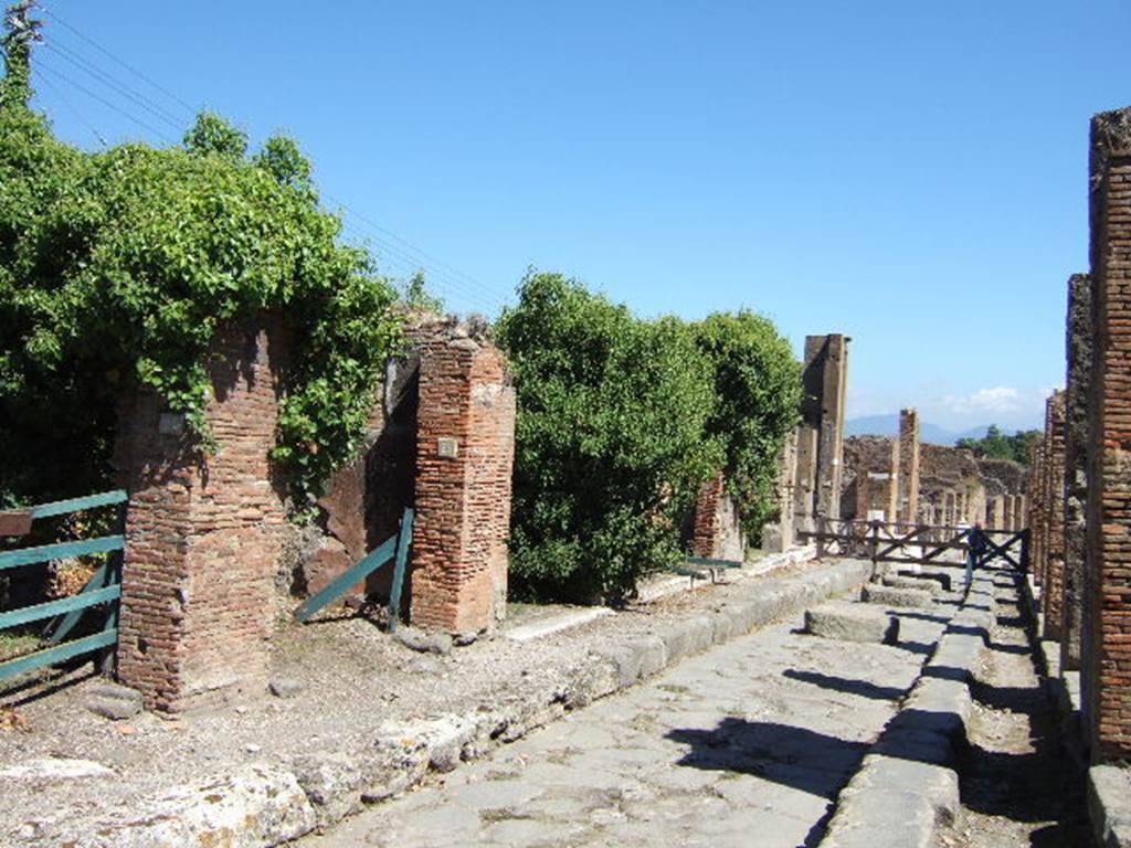 VII.4.26, VII.4.27 and VII.4.28 on Via degli Augustali, looking east.September 2005.