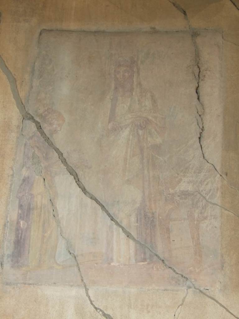 VII.4.31 Pompeii. March 2009. Room 29. Apsidal Exedra. Wall painting of A priestess receiving the offerings from a maid to deposit upon the altar.