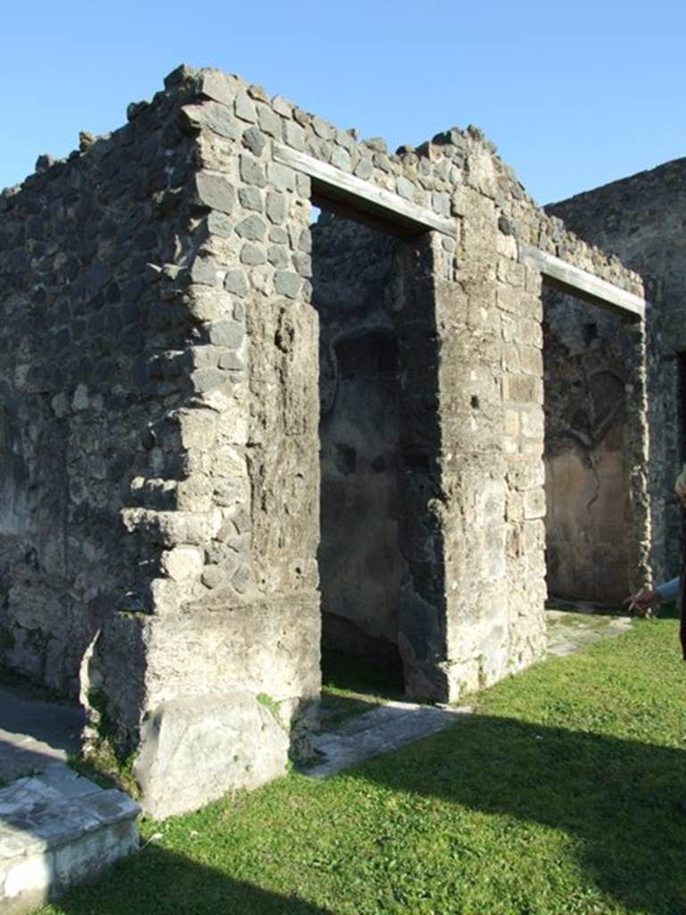 VII.4.31 Pompeii. March 2009. Doorways to Rooms 30 and 31.
