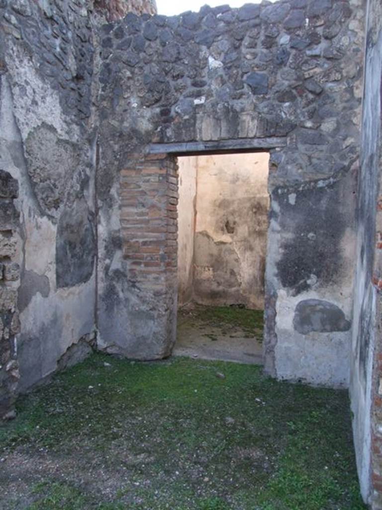 VII.4.31 Pompeii. March 2009. Room 32, at front, with Doorway into Room 33. Looking west.