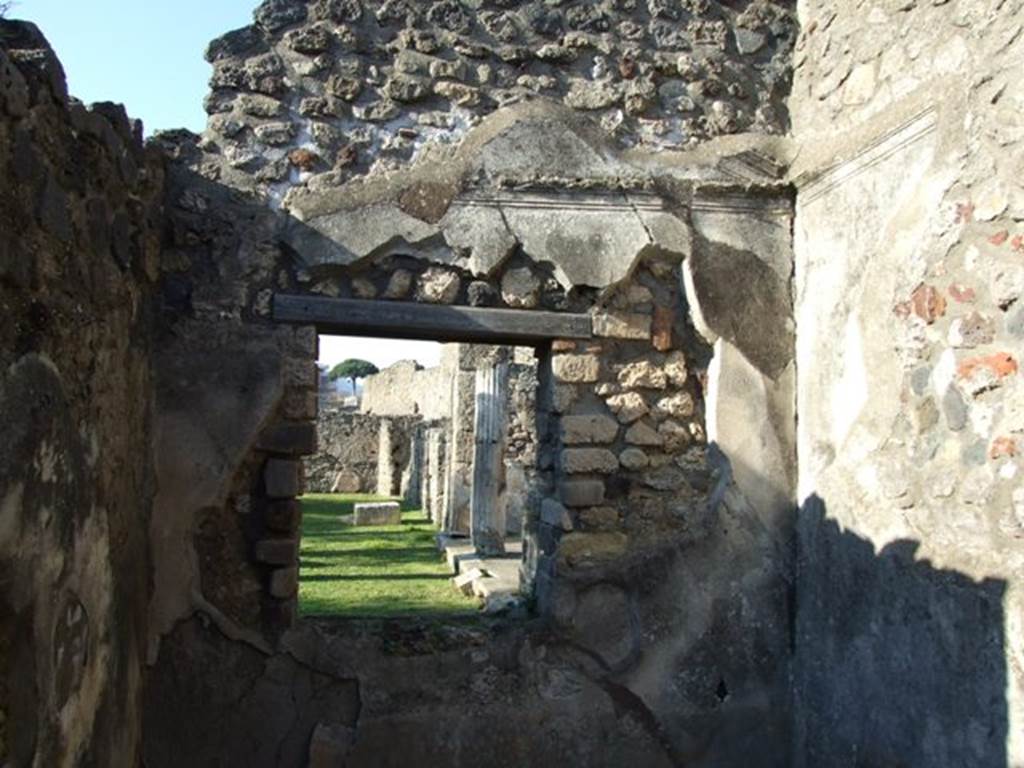 VII.4.31 Pompeii. March 2009. Room 35. North wall with window overlooking East Portico of North Peristyle.