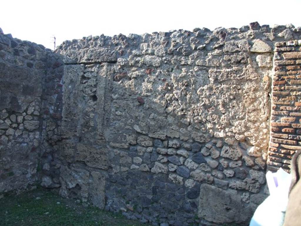 VII.4.31 Pompeii. March 2009. North Peristyle. North west corner, with blocked door to shop at VII.4.52.