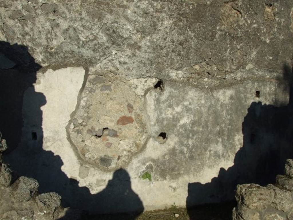 VII.4.31 Pompeii. March 2009. Room 45. East wall, with holes for shelving supports.