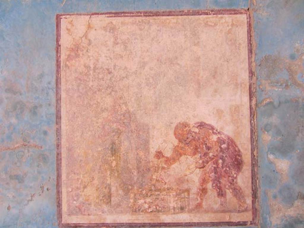 VII.4.31/51 Pompeii. May 2012. Room 18, south wall of exedra. Wall painting in central panel entitled “The Eros Shop”. Photo courtesy of Marina Fuxa.