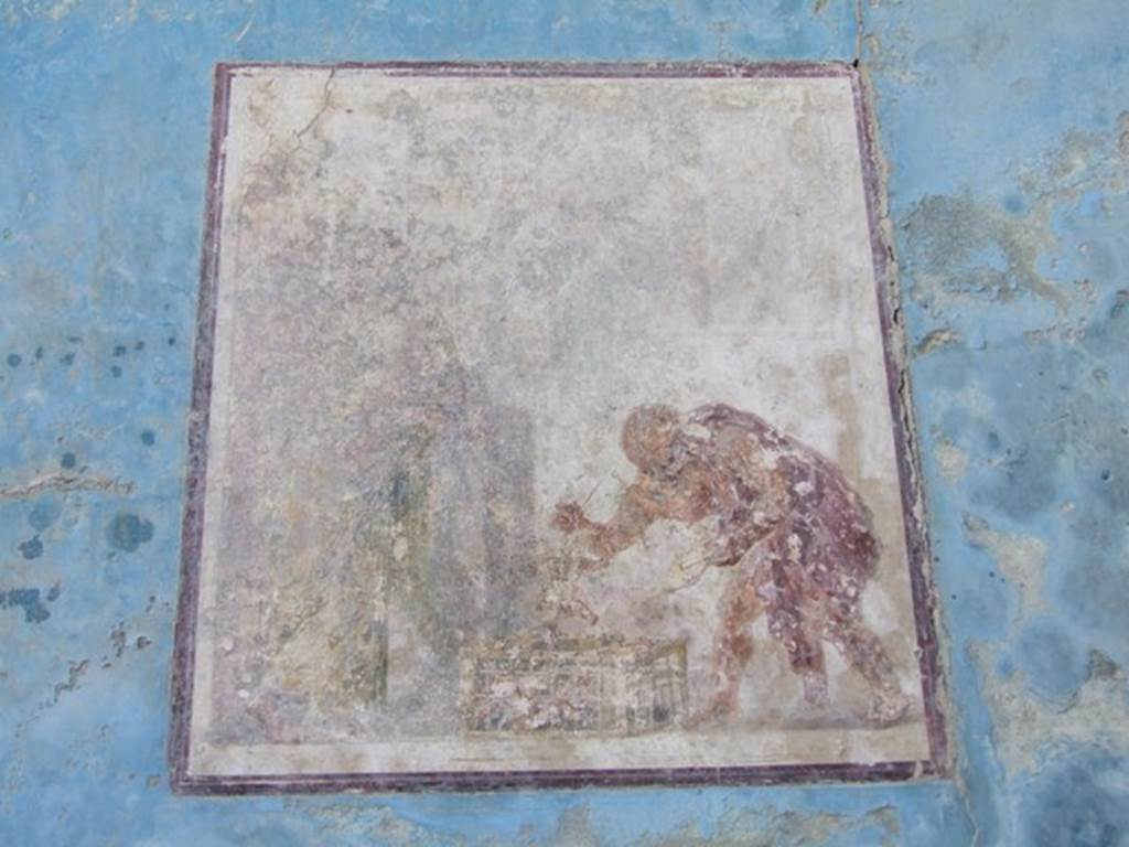 VII.4.31 Pompeii. March 2009. Room 18. Exedra. Wall painting in central panel on south wall. “The Eros Shop”.