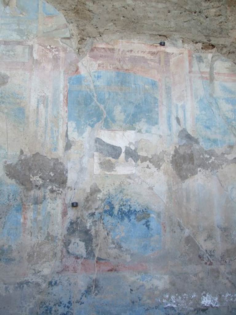 VII.4.31 Pompeii. March 2009. Room 18. Exedra. West wall. The central painting is now faded, or may never have been painted.