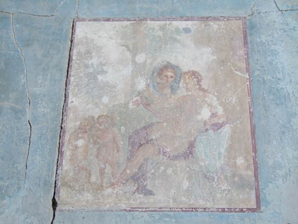 VII.4.31 Pompeii. March 2009. Room 18. Exedra. North wall. Wall painting of Adonis reclining in Aphrodite’s lap, on the left can be seen two cupids.
