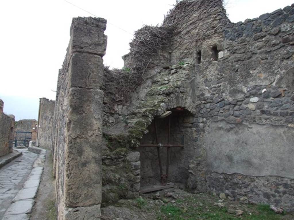 VII.4.36 Pompeii. December 2007. South wall with staircase and latrine beneath. Looking south along Vicolo Storto.