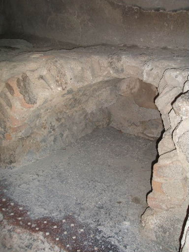 VII.4.37 Pompeii. May 2006. Hearth against north wall.