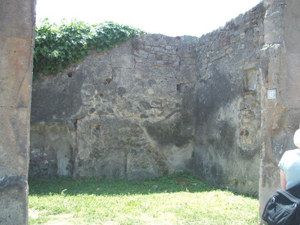 VII.4.47 Pompeii. May 2005. Looking south towards south-west corner of shop. In the west wall can be seen a small rectangular niche.
See Boyce G. K., 1937. Corpus of the Lararia of Pompeii. Rome: MAAR 14. (p.65, no.274)