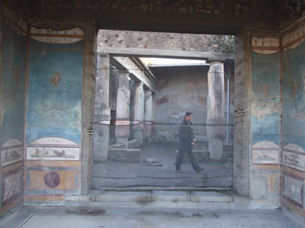 VII.4.48 Pompeii. December 2007. Room 11. Tablinum. South wall with doorway to peristyle.