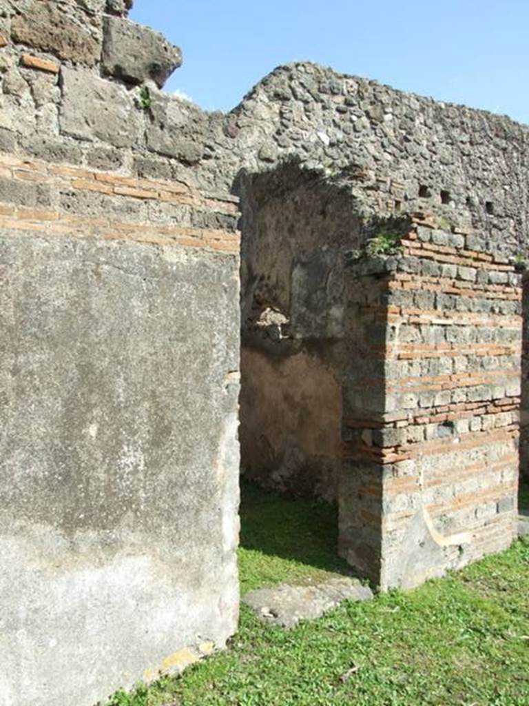 VII.4.56 Pompeii. March 2009. Doorway to Room 5 from atrium.
