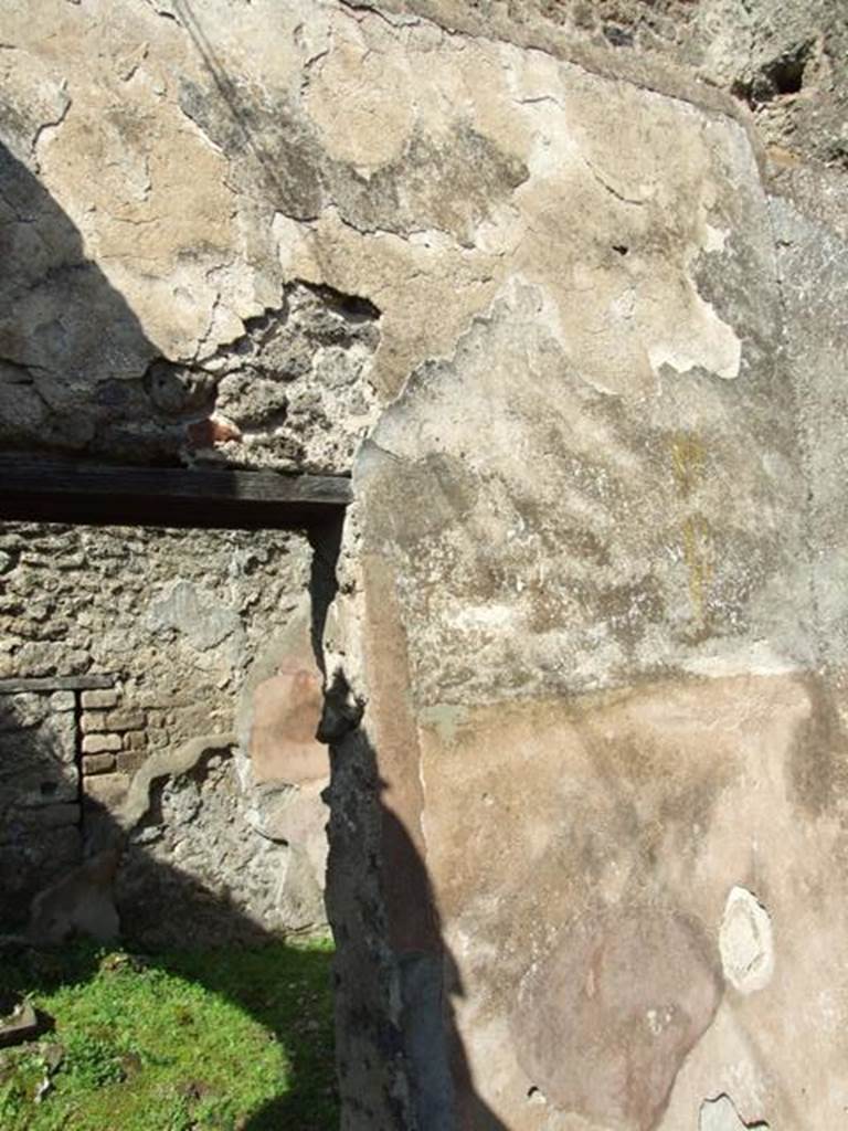 VII.4.56 Pompeii. March 2009. Room 5. North wall, with small doorway to Room 4.