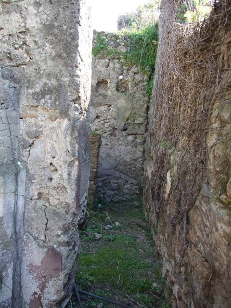 VII.4.56 Pompeii. March 2009. Doorway to Room 10. Kitchen and Latrine.
