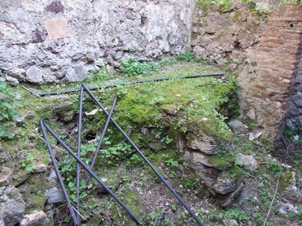 VII.4.56 Pompeii. March 2009. Room 10. Kitchen. Remains of hearth.