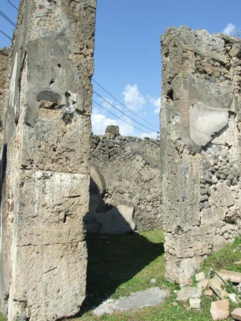 VII.4.57. Pompeii.  March 2009.  Doorway to Room 2. Oecus.