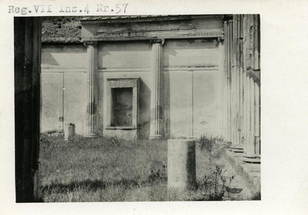 VII.4.57 Pompeii. Pre-1937-39. Aedicula Lararium against west wall of peristyle.
Photo courtesy of American Academy in Rome, Photographic Archive. Warsher collection no. 1773.
According to Boyce, the row of columns forming the western portico of the peristyle is built into the wall.
A rectangular niche bordered by solid walls stands upon a masonry base.
See Boyce G. K., 1937. Corpus of the Lararia of Pompeii. Rome: MAAR 14. (p.66, no.282, and Pl.35,3).