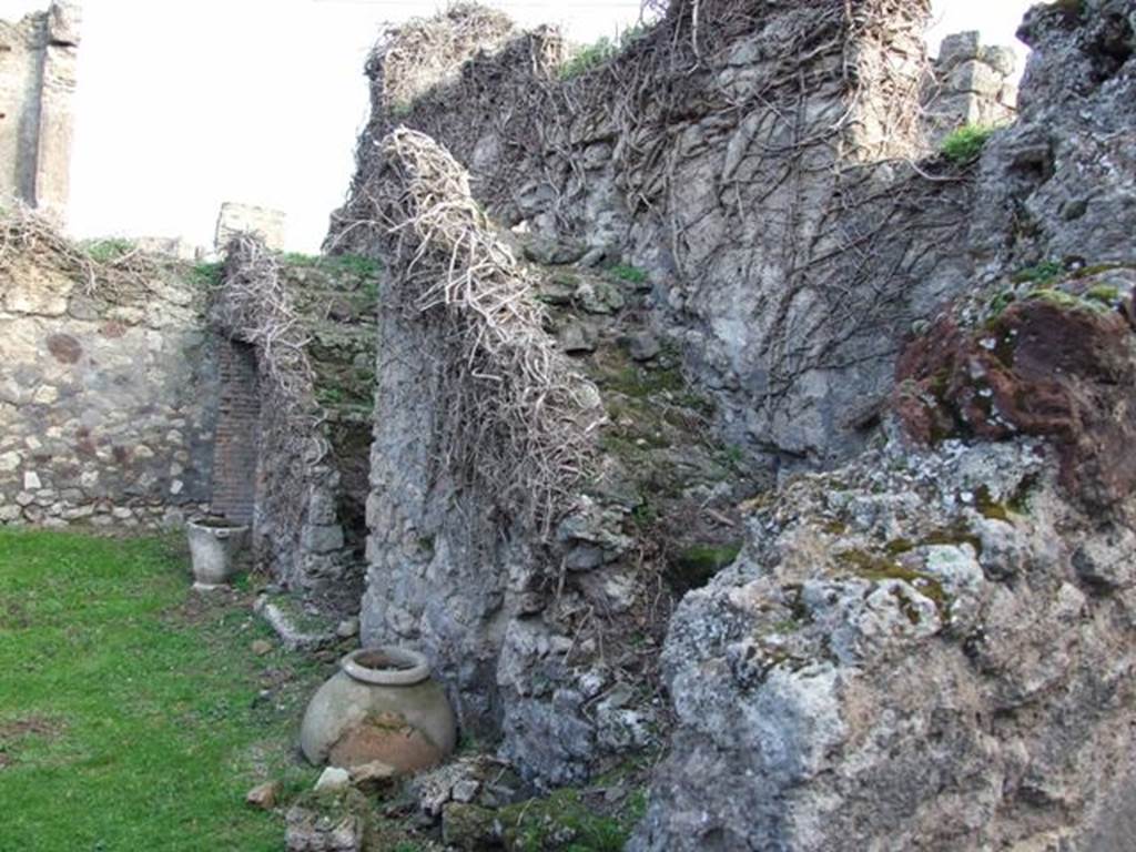 VII.4.58 Pompeii. December 2007. Two rear staircases leading to upper floor. Looking east along south wall.