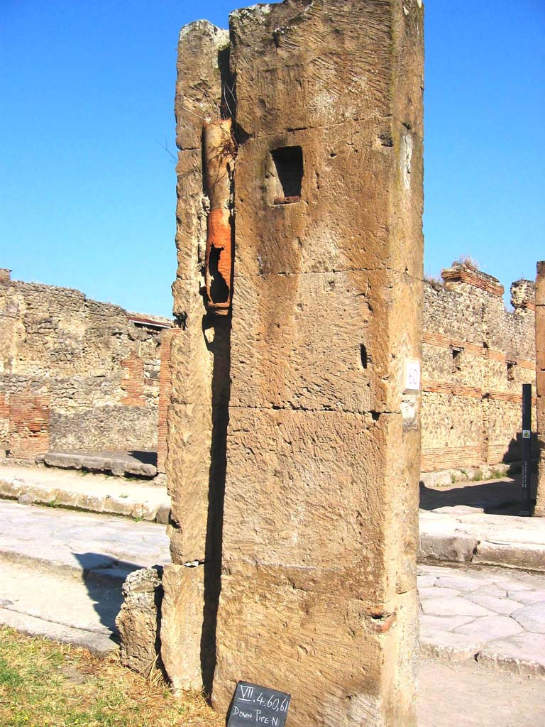 VII.4.60/61 Pompeii. July 2008.
Looking north to rear of pilaster with downpipe, between VII.4.60 and VII.4.61.
Photo courtesy of Barry Hobson.