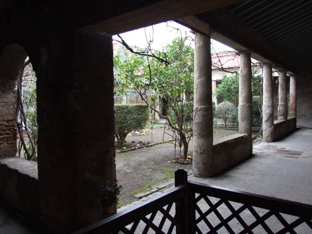 VII.5.24 Pompeii. March 2009. Looking south west across courtyard (5). The courtyard was enclosed by a portico (7) supported by columns on the west and north, and by brick pillars supporting arches on the east. See Jashemski, W. F., 1993. The Gardens of Pompeii, Volume II: Appendices. New York: Caratzas. (p.183).