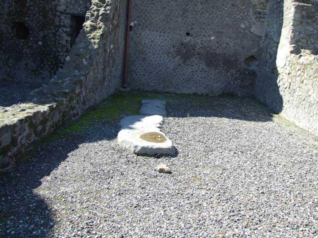 VII.5.26 Pompeii. March 2009. On the rear (west) wall, there are the remains of the line of the stairs to upper floor.