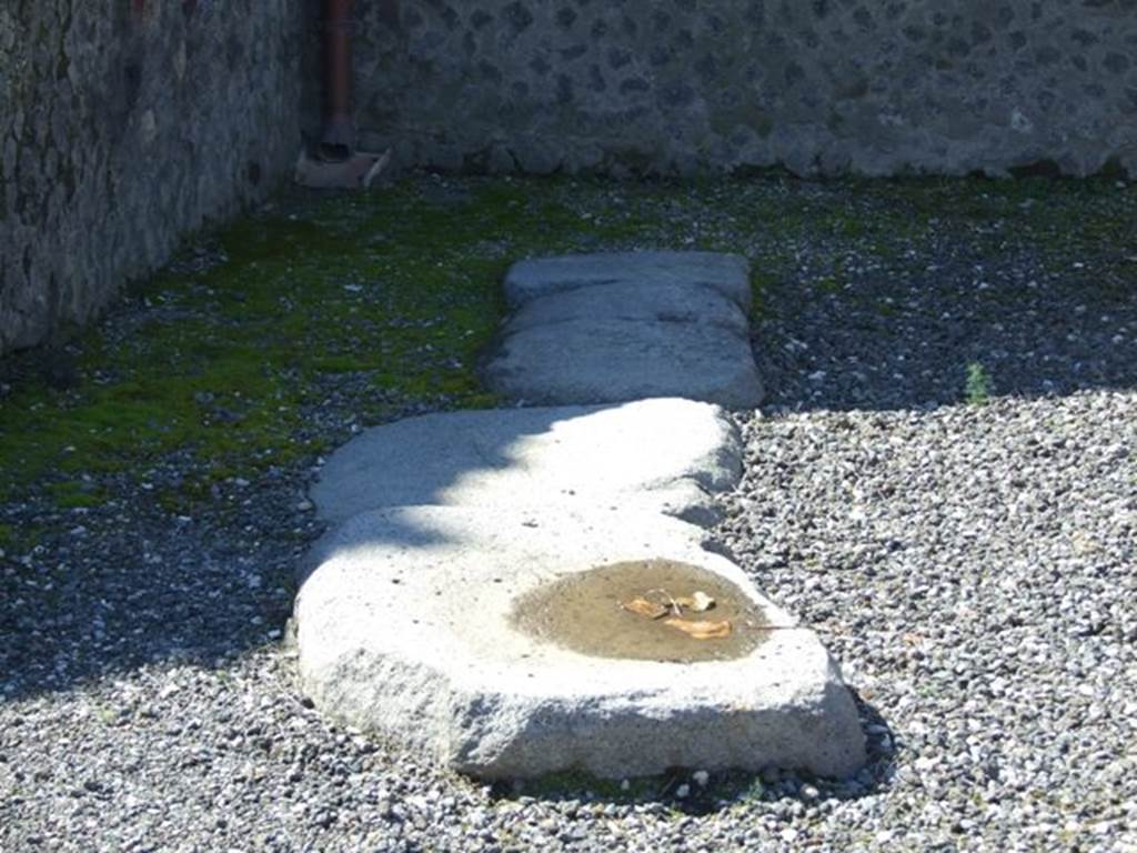 VII.5.26 Pompeii. March 2009. Four large lava flat bases joined together.