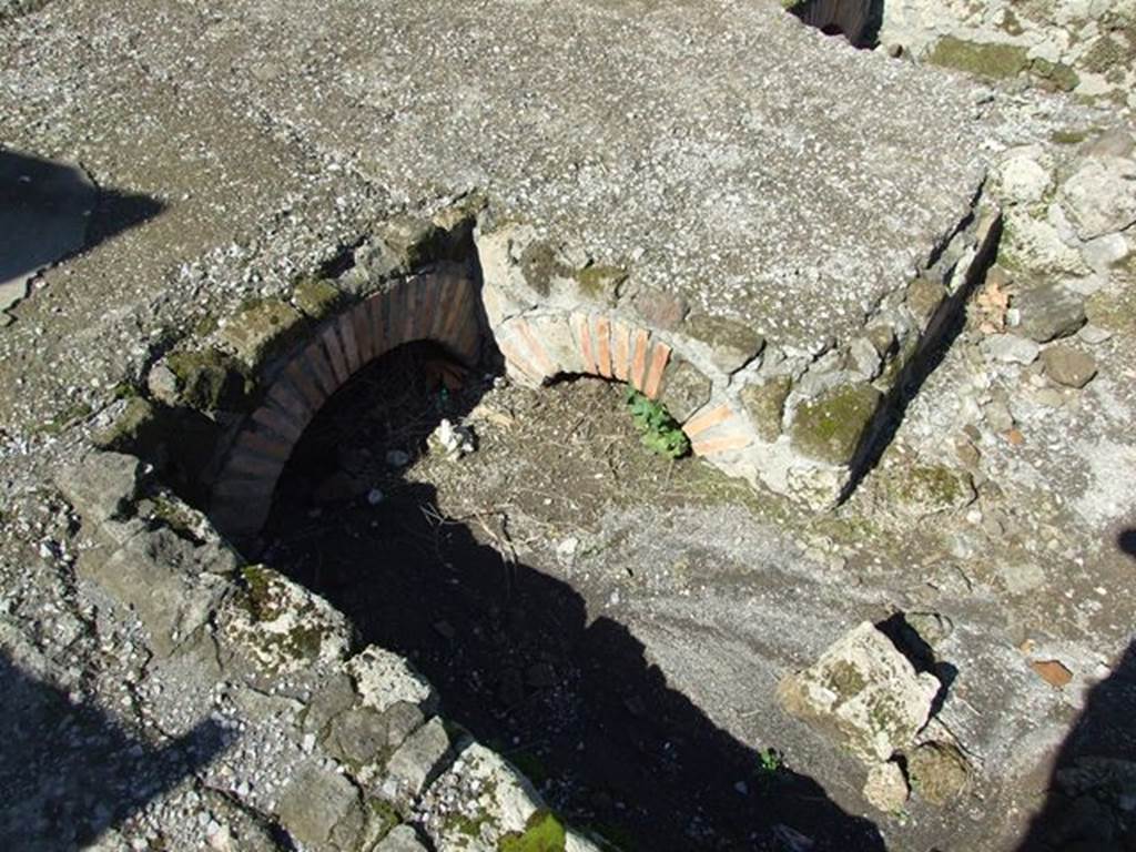 VII.6.1 Pompeii. March 2009. Road drains on south side at the end of the Via delle Terme, where it joins Vicolo del Farmacista.