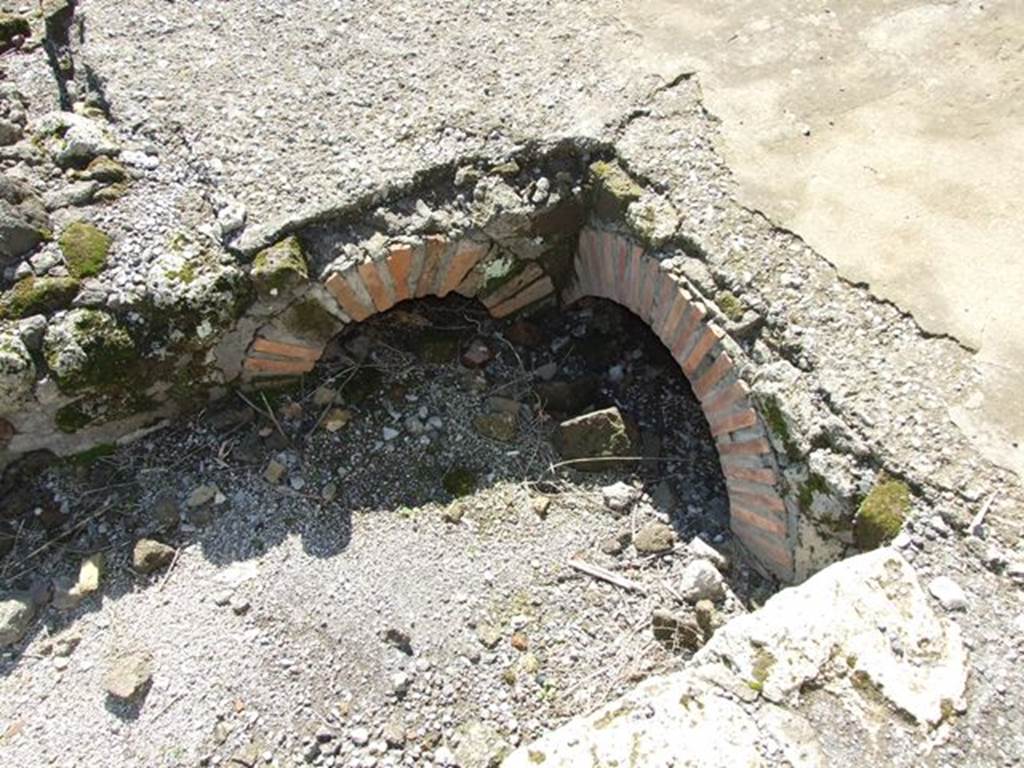 VII.6.1 Pompeii. March 2009. Road drains on north side at the end of the Via delle Terme, where it joins Vicolo del Farmacista.