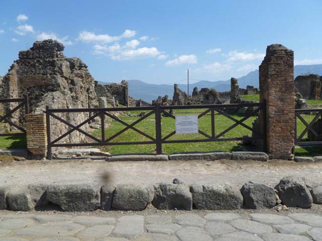 VII.6.9/8 Pompeii. May 2011. Looking south towards entrance doorways. The base-step of the stairs to the upper floor at VII.6.9 can be seen on the left of the wider entrance of the shop at VII.6.8. Photo courtesy of Michael Binns.