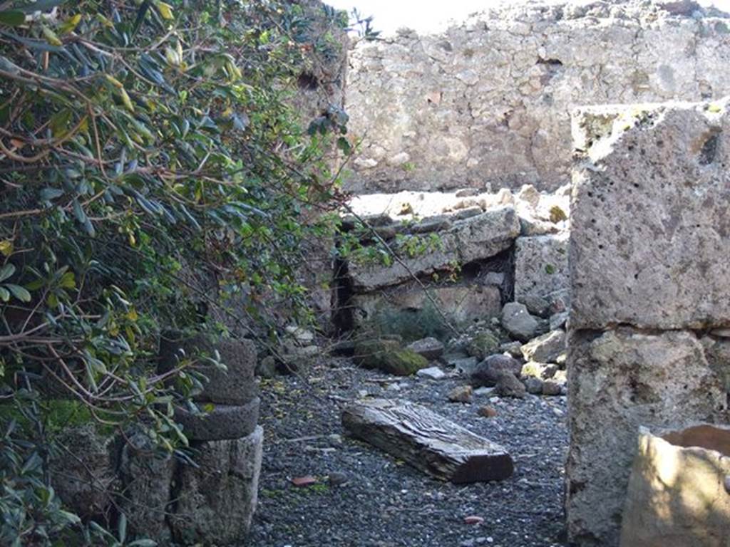 VII.6.21 Pompeii. March 2009. Looking west into rear room, site of kitchen with hearth and latrine.