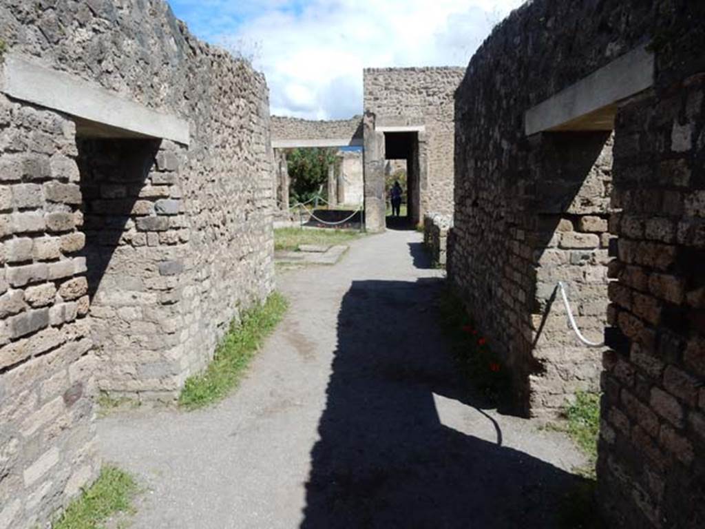 VII.7.2 Pompeii, May 2018.
Looking north along entrance corridor “a”, with doorway to room “b” on left, and room “c” on right. Photo courtesy of Buzz Ferebee.
