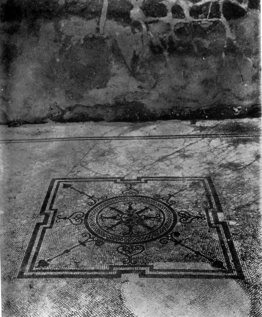 VII.7.2/5, Pompeii. c.1930. Central emblema and flooring in room (n).
According to Blake –
The house bears evidence of several transformations.
There is no way of knowing to which one of those transformations the centre represented above belongs.
The design, though composed of elements common to the mosaics of the period, is so far as I know, unique.
See Blake, M., (1930). The pavements of the Roman Buildings of the Republic and Early Empire. Rome, MAAR, 8, (p.114 & Pl.23, Tav. 3)