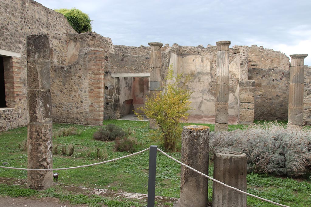 VII.7.2 Pompeii. October 2024.
Looking north across peristyle towards doorways to rooms “z1” and “y”, with room “z”, on right. Photo courtesy of Klaus Heese.
