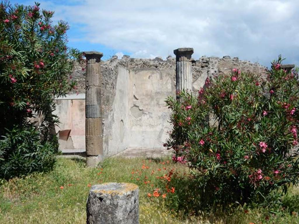 VII.7.2 Pompeii, May 2018. Looking towards north side of peristyle “x” with exedra “y”, in centre. Photo courtesy of Buzz Ferebee