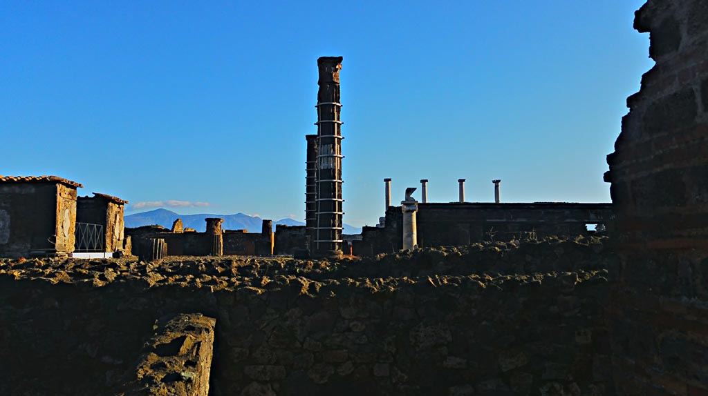 VII.7.2 Pompeii. December 2019.
Looking east towards Temple of Venus, cross two boundary walls with a space between.
Photo courtesy of Giuseppe Ciaramella.
At some stage in its early life, the wall between the Temple and the Casa di Trittolemo was rebuilt.
According to Cooley – an inscription related to changes either in the sanctuaries’ relationship with the Forum, to the east, or with private houses to the west, gave legal permission for the blocking off of light from the spaces adjacent to the sanctuary.
For the inscription -
Marcus Holconius Rufus, duumvir with judicial power for the third time and Gnaeus Egnatius Postumus, duumvir with judicial power for the second time, in accordance with the decree of the town councillors paid 3,000 sesterces for the right to block off light and saw to the building of a private wall belonging to the Colonia Veneria Cornelia as far as the roof.
See Cooley, A. and M.G.L., 2004. Pompeii: A Sourcebook. London: Routledge, (p.84-5, E1 – CIL X 787 = ILS 5915 (c. before 2 BC).
(See also VII.7.32).