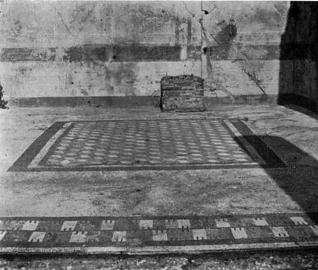 VII.7.5 Pompeii. c.1930. Exedra (u)/tablinum, looking north across flooring.
According to Blake –
Almost next door to the Apollo temple, in VII.7.5, the tablinum, if such it be, has a similar sectile centre enclosed in simple bands of mosaic. A band of yellow tesserae serves to connect with it, in date, the threshold which employs identical tesserae for its pattern, a textile design suggesting to the Romans a turreted wall. The background, except for a strip along the back wall, where some large piece of furniture possibly protected the floor from wear, consists of coarser tesserae and probably dates from a later period. (p.38)
In a previous chapter we have mentioned the “turreted border” which formed the threshold of the tablinum of VII.7.5, containing an early sectile centre. Apparently this should be identified as a “textile pattern.” (p.73)
See Blake, M., (1930). The pavements of the Roman Buildings of the Republic and Early Empire. Rome, MAAR, 8, (p. 38 & p.73, & Pl.6, tav.2)
