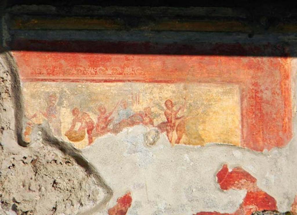 VII.7.5 Pompeii. 2013. Oecus (m) north wall east side of peristyle.
Wall painting of cupids making flower garlands. Photo courtesy of Davide Peluso.