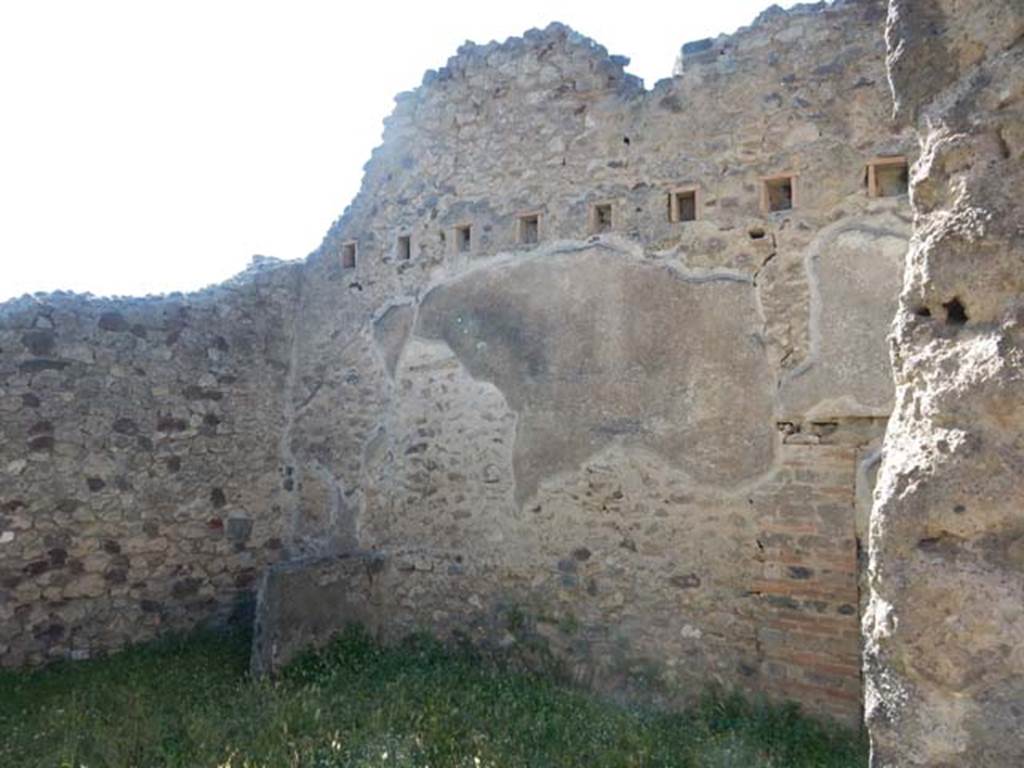 VII.7.10 Pompeii. May 2018. Room (v), looking from doorway towards north-west corner of room, a possible storeroom with latrine.
In the north-east corner of this room, on right, is the blocked doorway opposite VII.15.1 in Vicolo del Gallo. Photo courtesy of Buzz Ferebee.