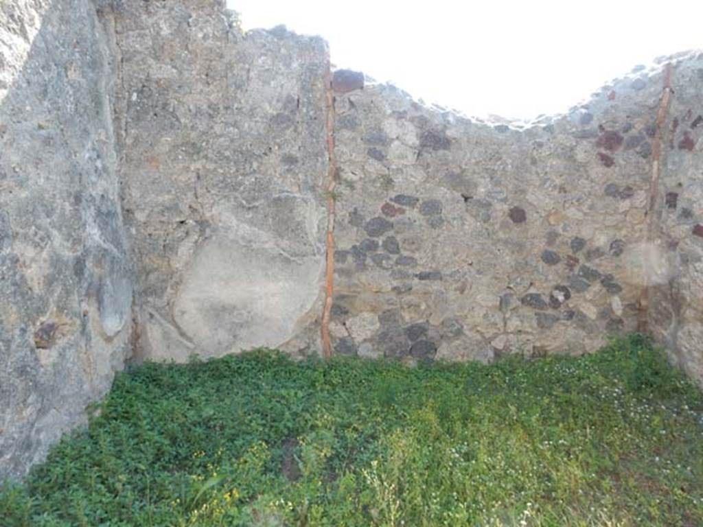 VII.7.10 Pompeii. May 2018. Room (c) on west side of atrium, looking west. Photo courtesy of Buzz Ferebee.
According to Sogliano, fragments of a painting were found in this cubiculum. He described –
“Here you can see the remains of a figure, as it seems, manly, sitting and facing left. The upper part of the body was naked, the lower part covered with a dark-red cloak, which descending along his back rests with a sleeve on the left arm, and in whose hand he held an upside-down thyrsus. The head was missing as well as all of the right side of the figure with his legs; judging from its great abandonment one would think of Dionysus."
(“Vi si vede l’avanzo di una figura, come pare, virile, seduta e rivolta a sinistra. Nuda la parte superiore del corpo ha la inferiore coverta di clamide rosso-scura, la quale scendendole lungo il dorso riposa con un lembo sul braccio sinistro, che era poggiato, e nella cui mano essa regge un tirso capovolto. Manca la testa e tutto il lato destra della figura con le gambe; a guidicare dal suo mole abbandono si penserebbe a Dioniso.”)
Sogliano, A. (1879): Le pitture murali Campane scoverte negli anni 1867-79. (p.39, no.162).
Kuivalainen comments –
“Another variation of a common theme, in which the figure is identified by the thyrsus and the pose”.
See Kuivalainen, I., 2021. The Portrayal of Pompeian Bacchus. Commentationes Humanarum Litterarum 140. Helsinki: Finnish Society of Sciences and Letters, (p.101, B12).
