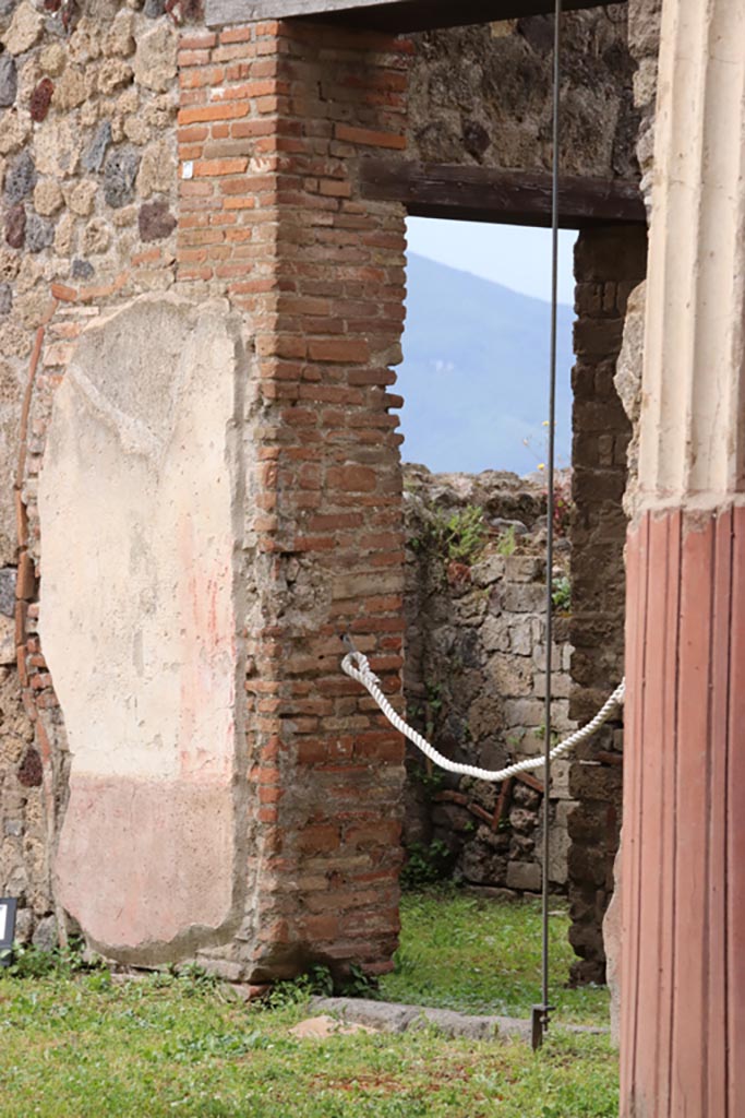 VII.7.13 Pompeii. May 2024.
Doorway to kitchen area in west wall of peristyle. Photo courtesy of Klaus Heese.