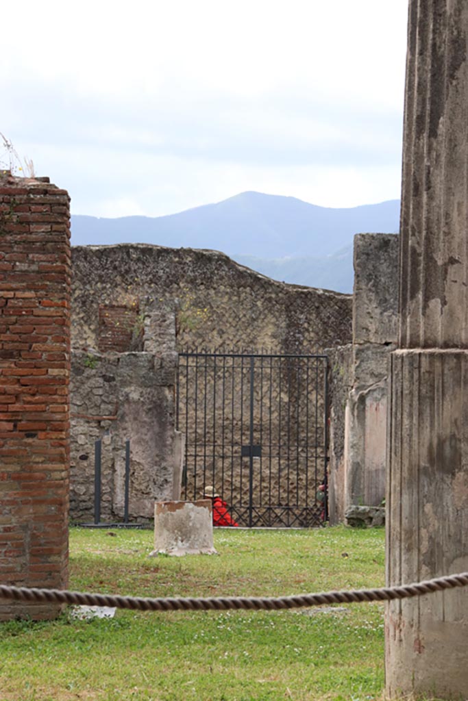 VII.7.13 Pompeii. May 2024.
Looking south across atrium towards entrance doorway at VII.7.10. Photo courtesy of Klaus Heese.