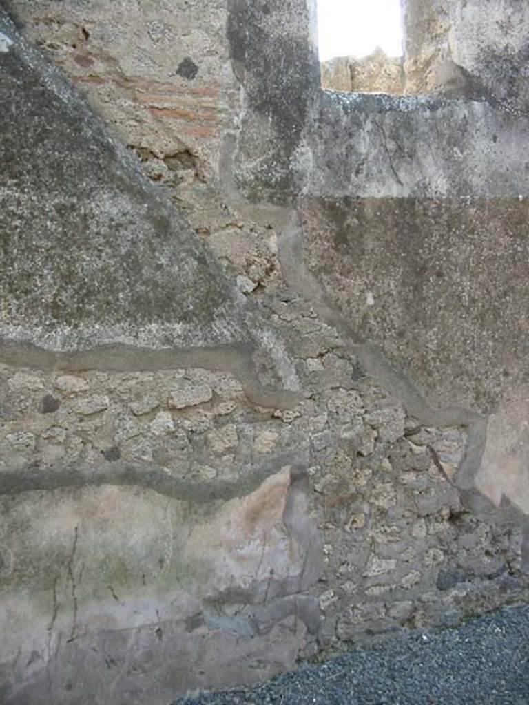 VII.7.18 Pompeii. May 2003. South wall of rear room with site of staircase showing in the plaster. Photo courtesy of Nicolas Monteix.