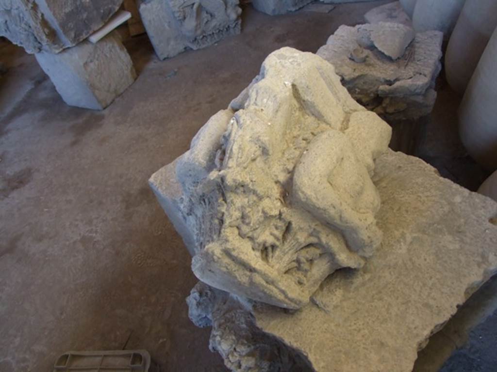 VII.7.29 Pompeii. December 2007. Remains of a capital from VII.4.51 in storage. The above photo shows the side that would have been pointing onto the Via della Fortuna.